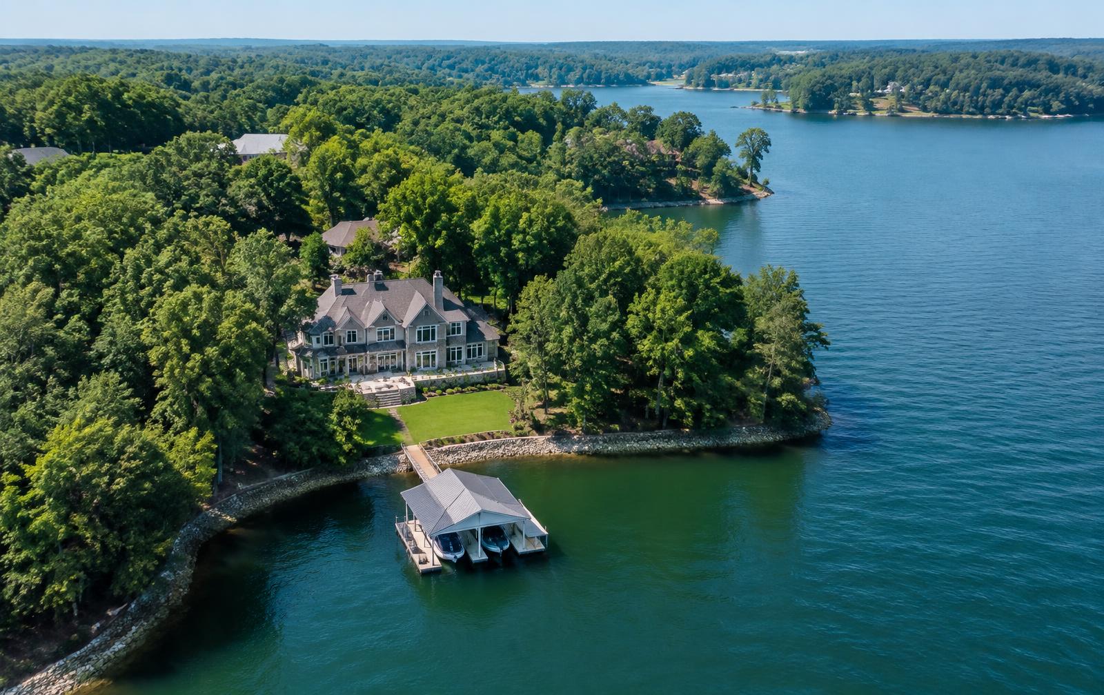 Aerial view of a Mooresville waterfront estate and covered dock